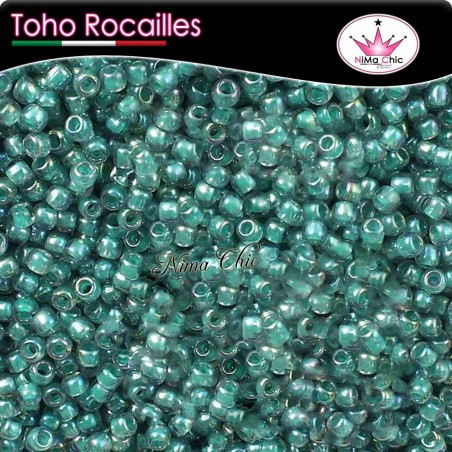 10 gr TOHO ROCAILLES 8/0 inside rainbow Lt. sapphire opaque teal lined